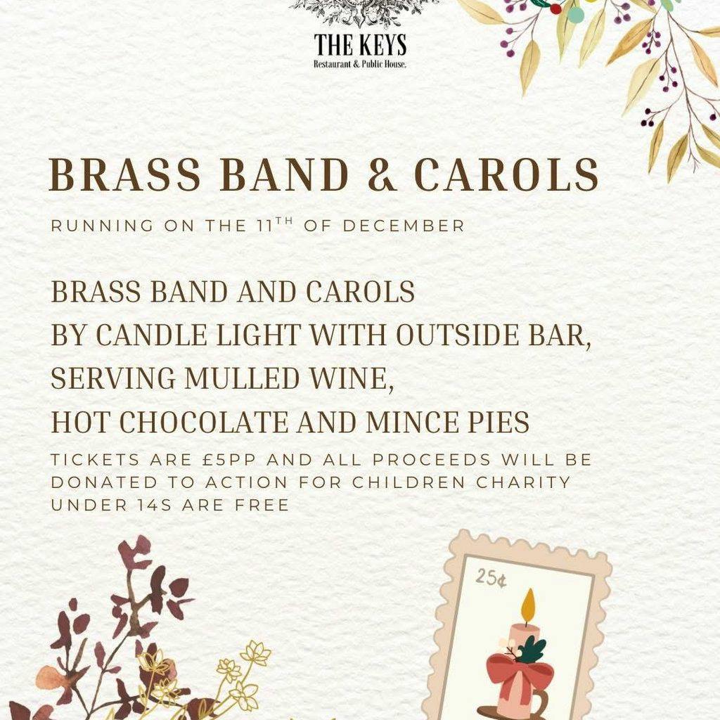Brass band & carols by candle light at The Keys