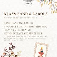 Brass band & carols by candle light at The Keys