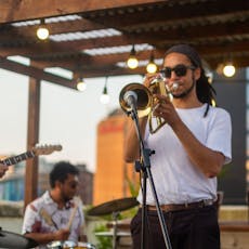 An Evening of Jazz?? Live music with Siglo Section at Jacobs Roof Garden